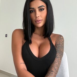 GINA AMIRA